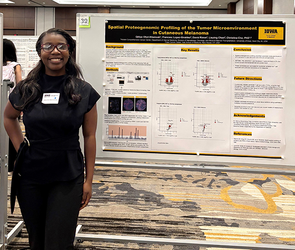 Gillian Ofori-Ntiamoah with her poster